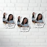 Three cut outs of a person holding a bottle with 'In My Engaged Era' text on a white brick wall background.
